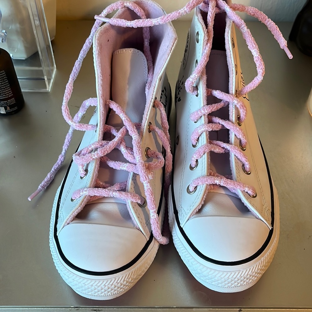 Brand new never worn white leather panda converse. Sold out everywhere